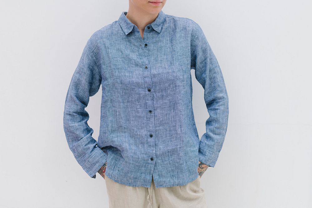 Cool woman in a blue linen shirt