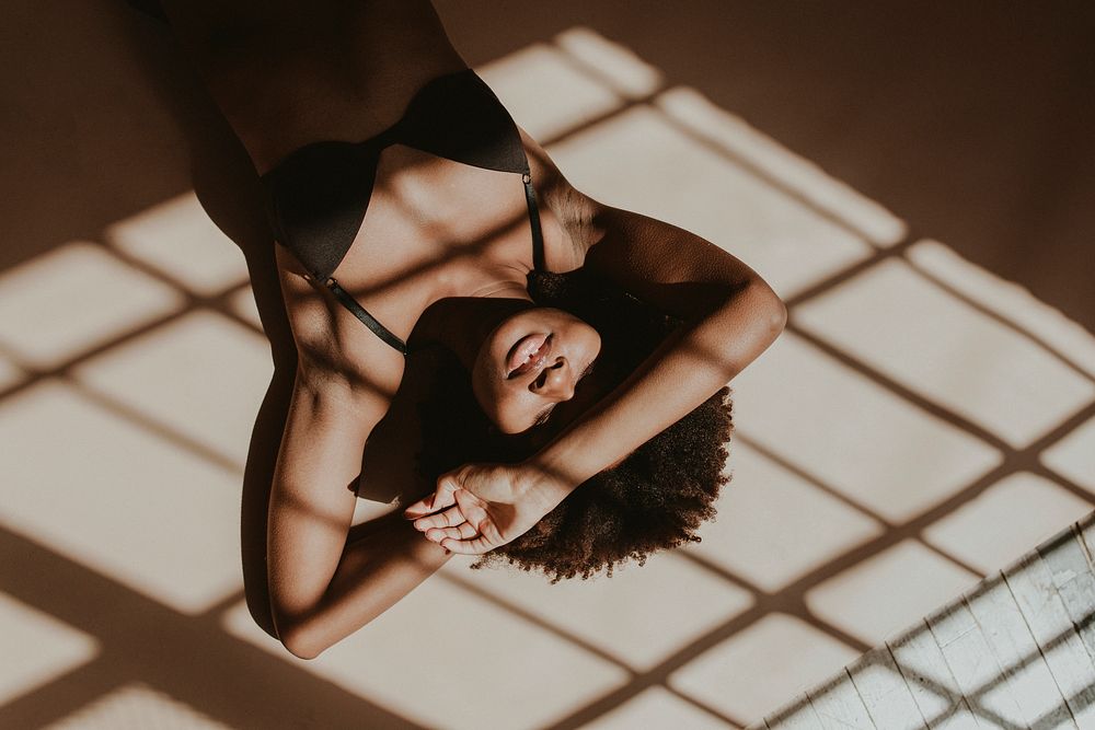 Shadows over a sensual black woman