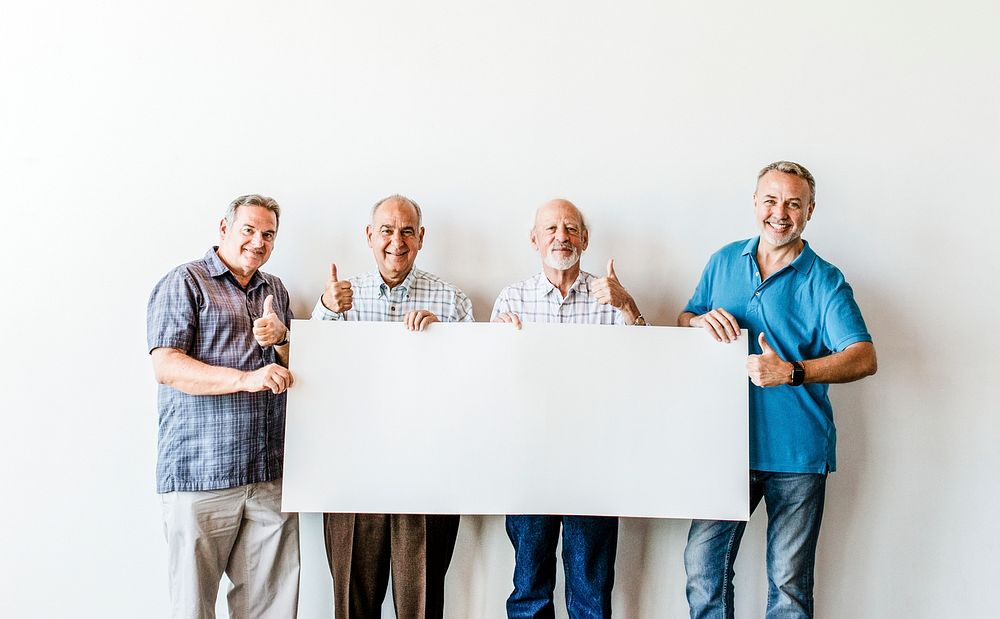 Elderly men holding a blank poster mockup