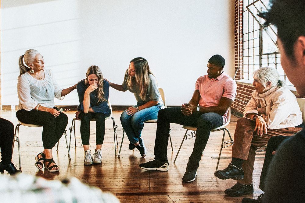 People support each other in a rehab session