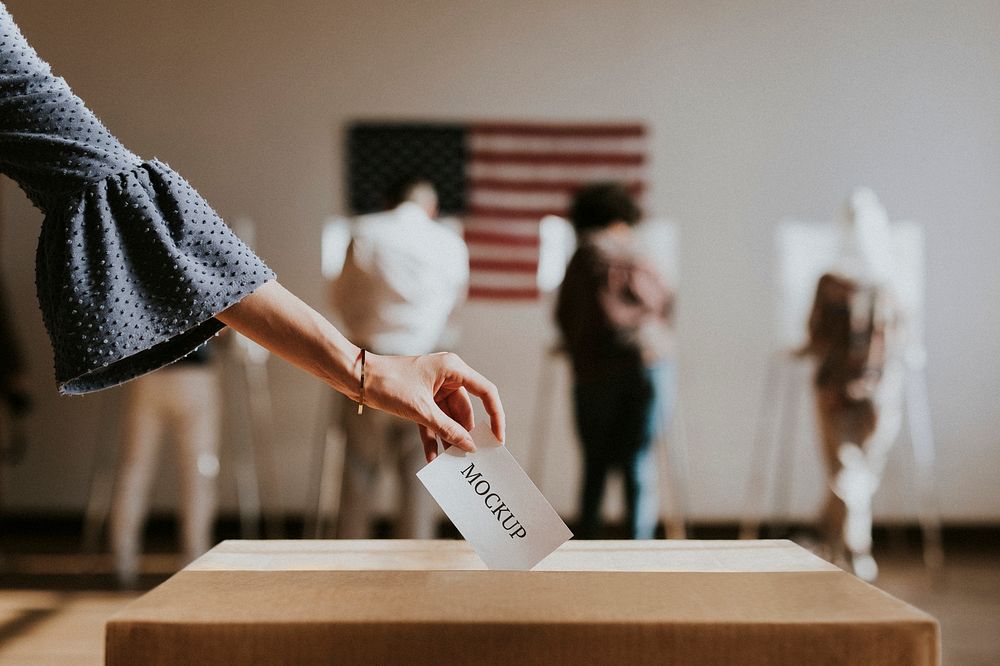 American casting her vote to a ballot box mockup