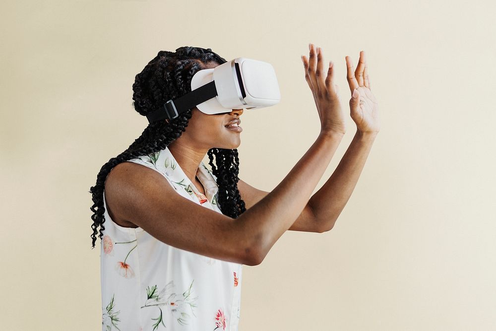 Black woman enjoying a VR headset mockup