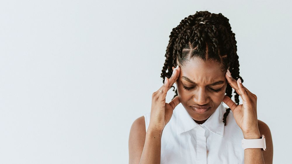 Stressed woman touching his head