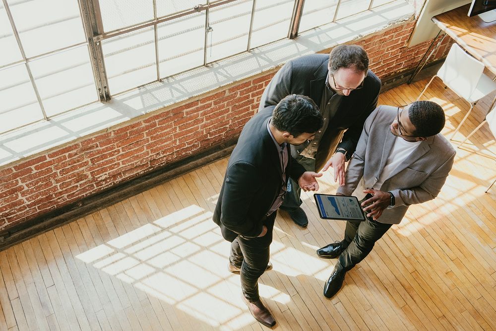 Business people talking by the windows