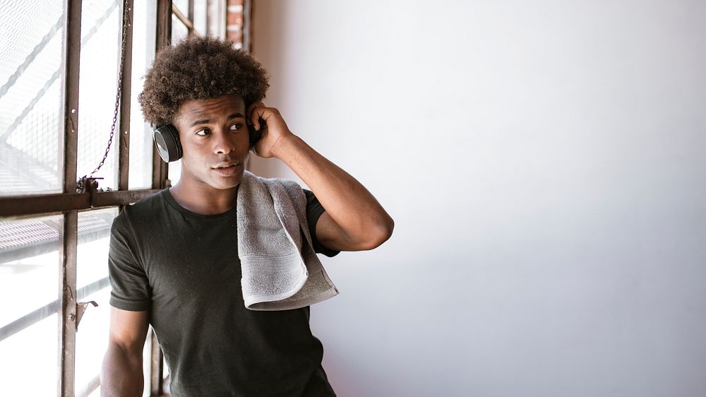 African American boy enjoying post workout music session