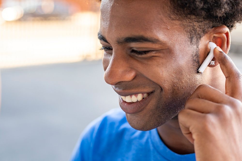 Man listening music wireless earphones | Premium Photo - rawpixel