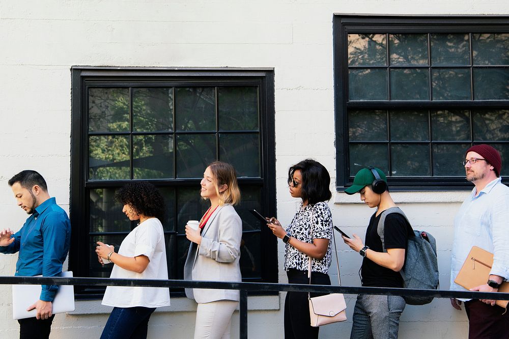 Business people waiting in line