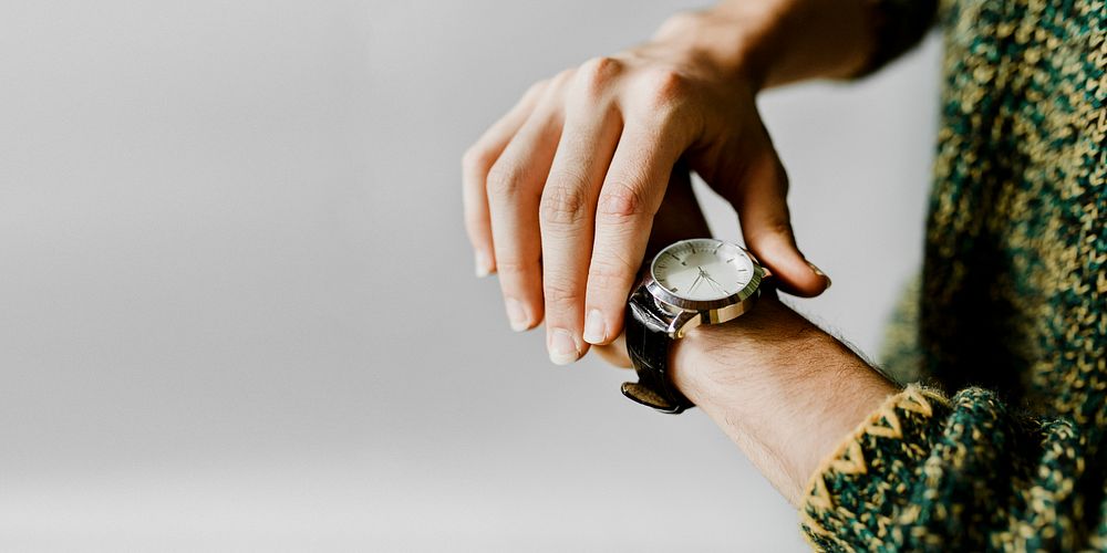 Closeup of a black watch on a wrist social banner