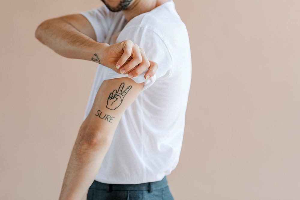 Man with tattoos on his arms