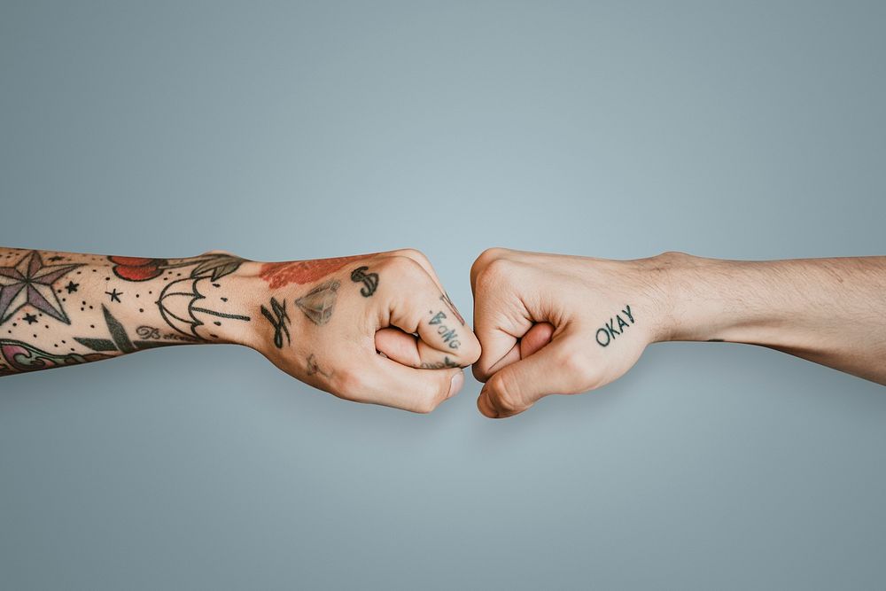 Friends giving each other a fist bump mockup