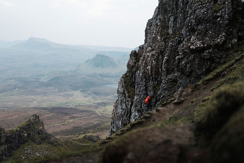 Female mountain climber at Quiraing on the Isle of Skye in Scotland