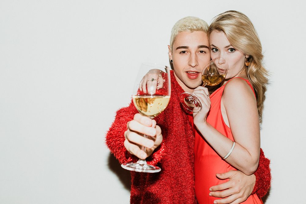 Young stylish couple with champagne