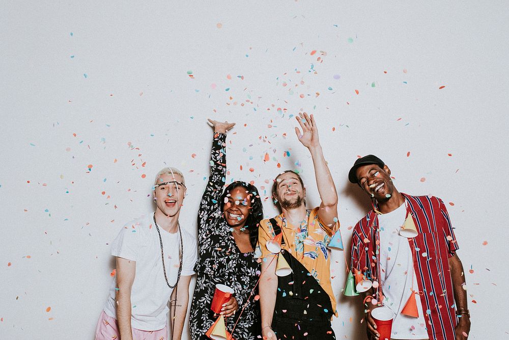 A group of diverse friends celebrating at a party