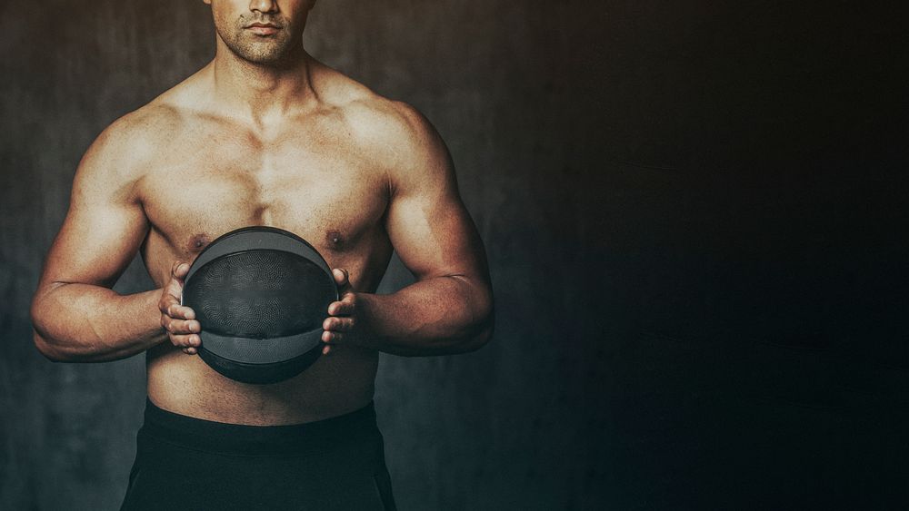 Weight training by using a medicine ball wallpaper