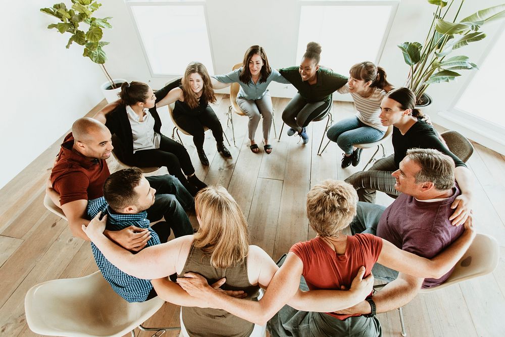 Diverse people in a support group session