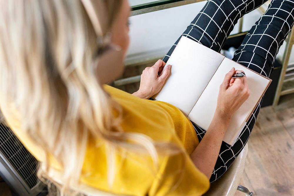 Casual woman planning a project in an office