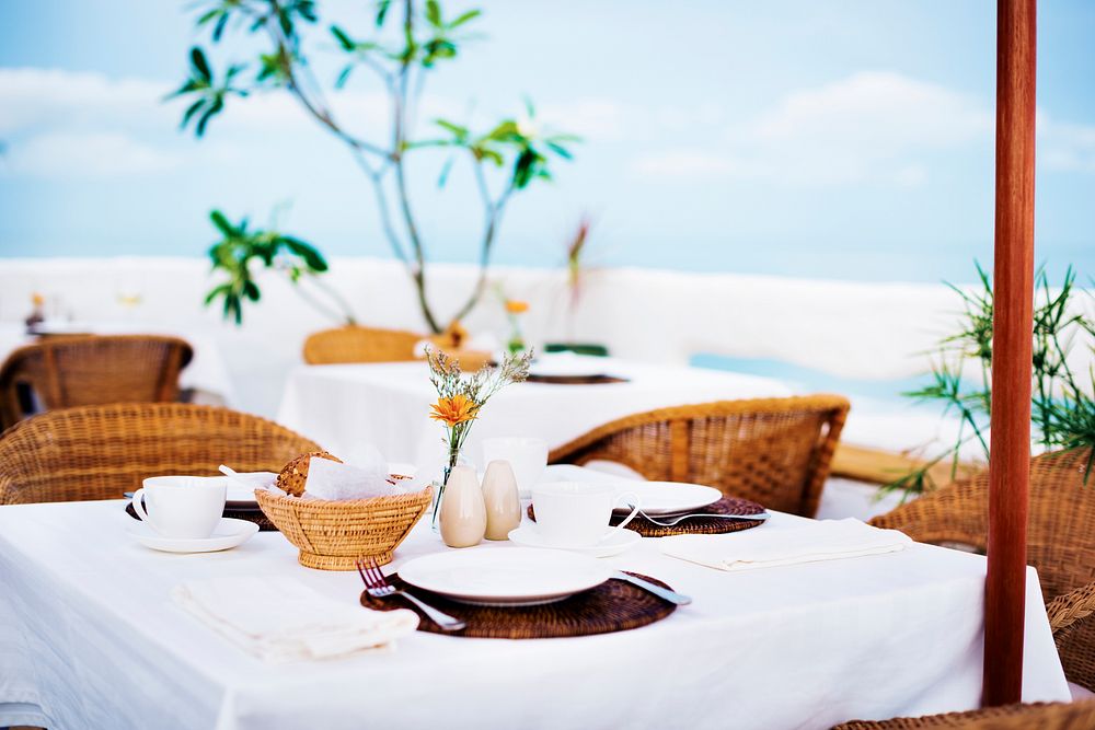 Close up of a table setting at a beach restaurant