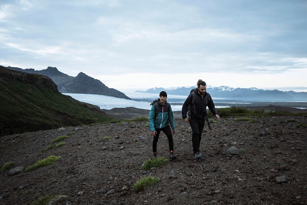 Men hiking at the South Coast of Iceland