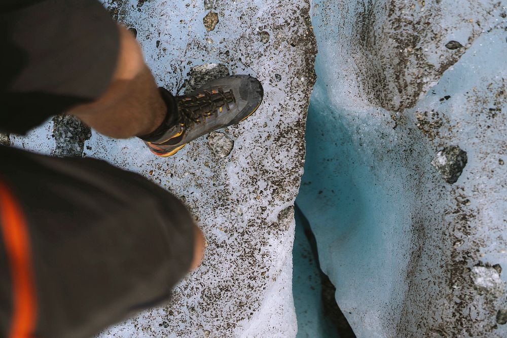 Athletic man on the edge of Chamonix Alps in France