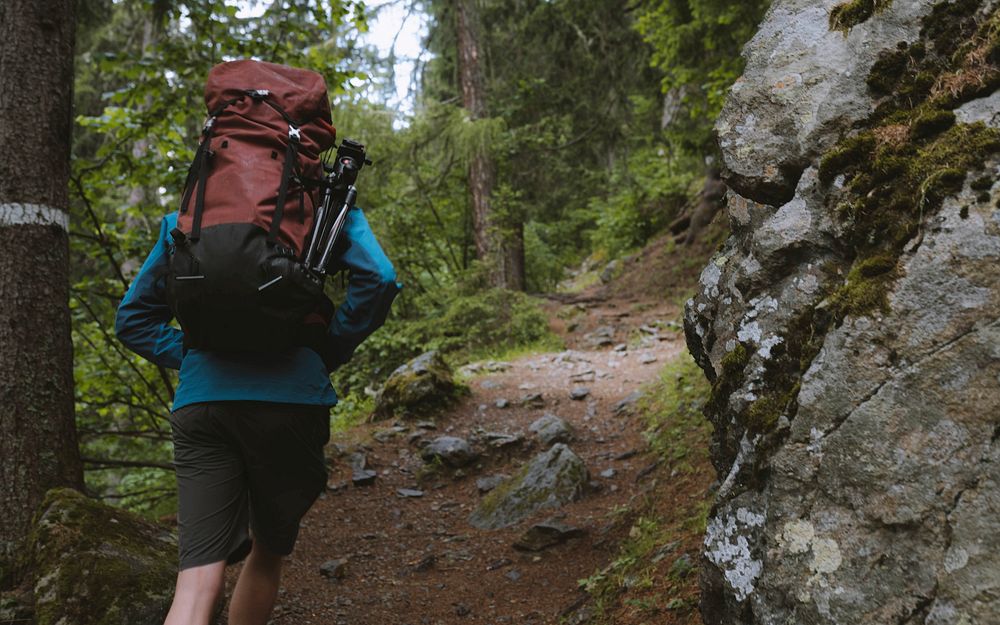 Backpacker hiking in Chamonix Valley
