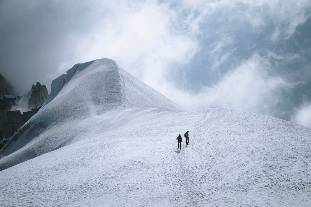Hikers going up Chamonix Alps in France