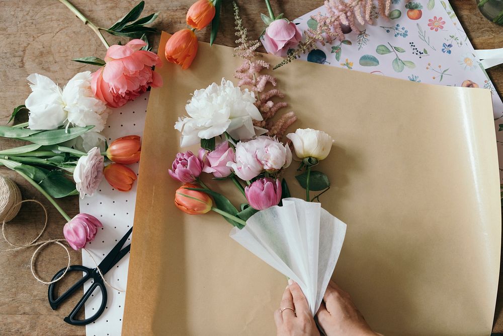 Florist arranging a bouquet of flower