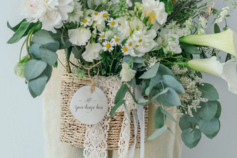 Wooden basket of white flowers