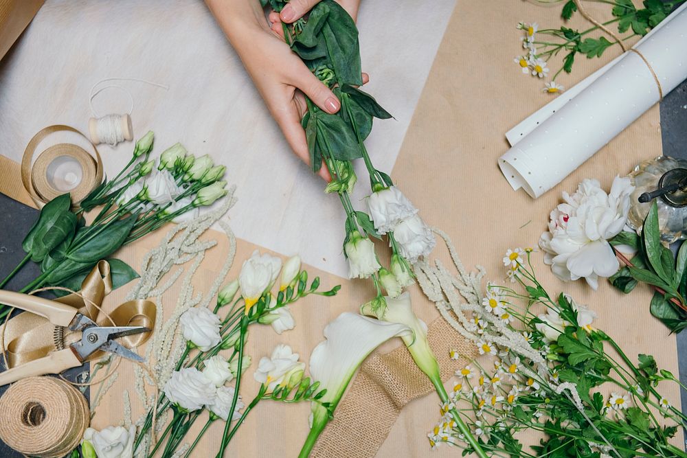 Woman making a flower bouquet