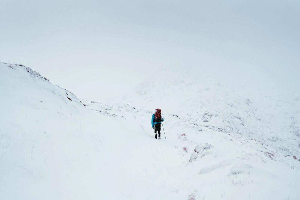 Mountaineer climbing Forcan Ridge in Glen Shiel, Scotland