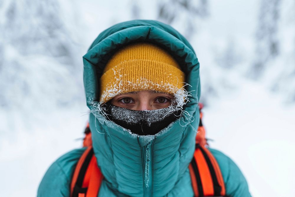 Female mountaineer in wintertime at Glen Coe, Scotland