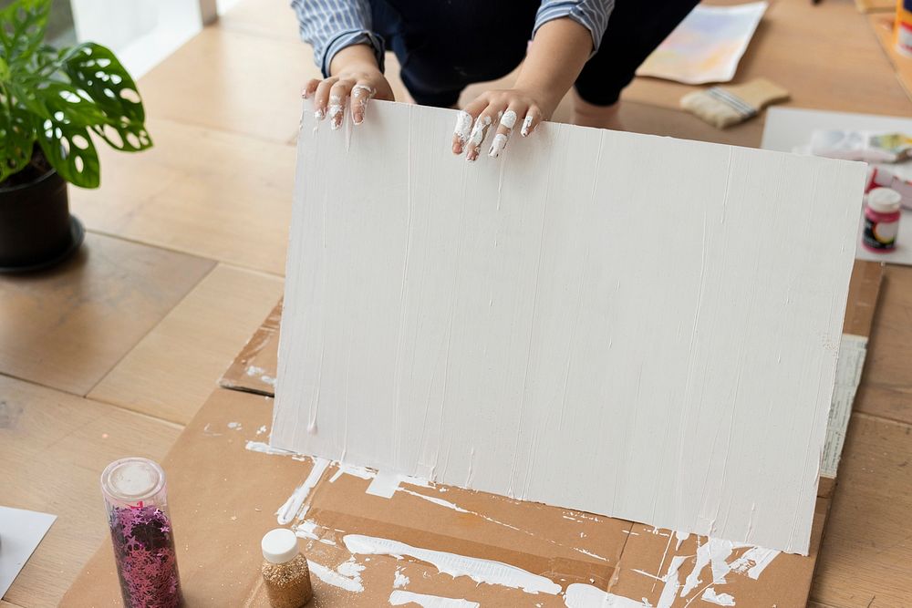 Painted white background on wooden floor