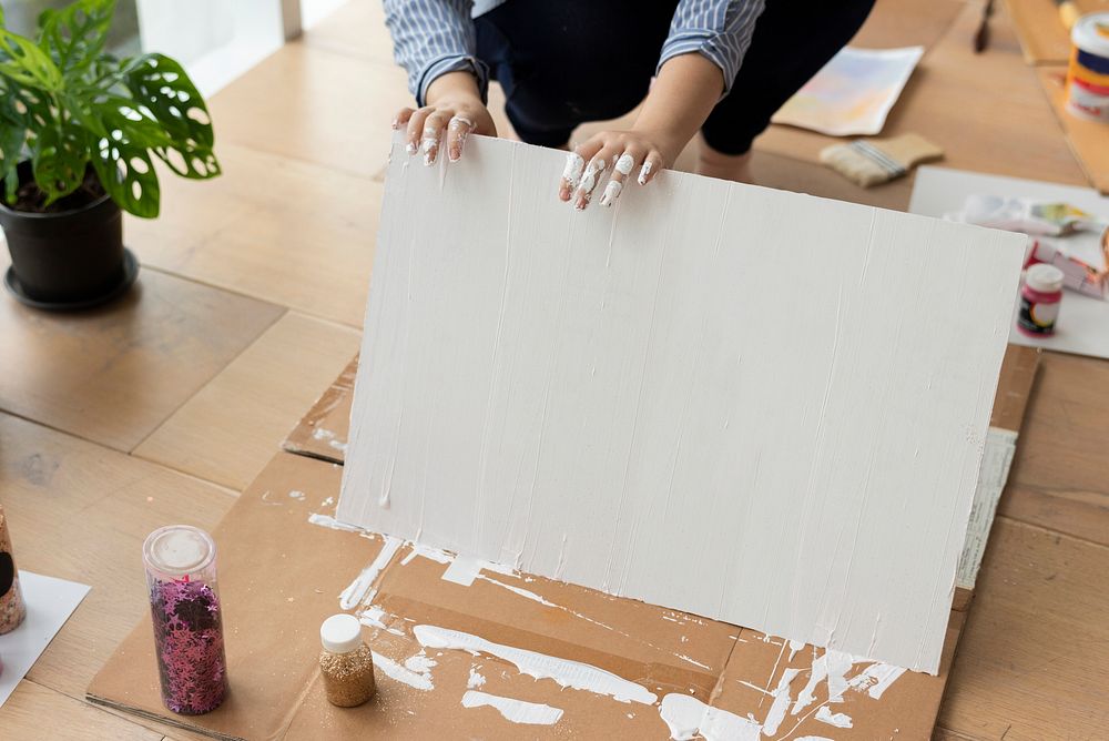 Painted white background on wooden floor