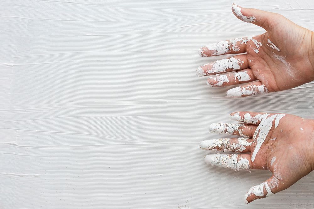 White color stained on an artist hands