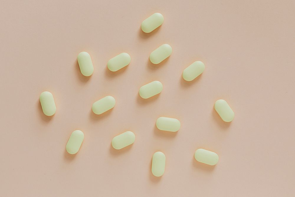Yellow antibiotics on a beige background 