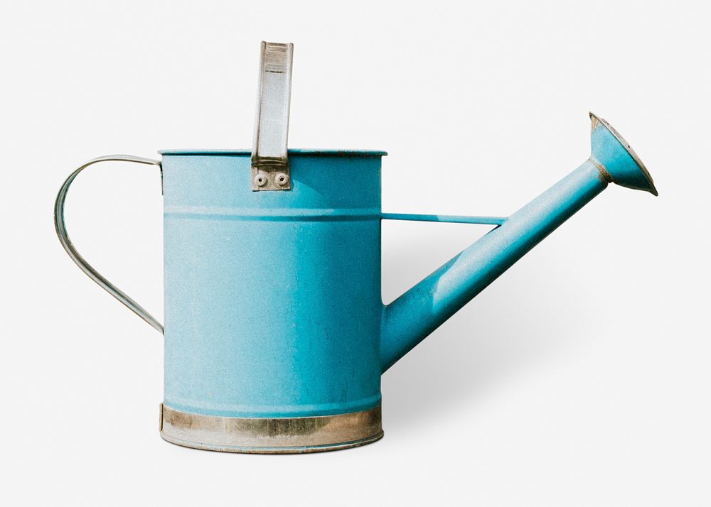 Blue watering can with trowel on wooden table