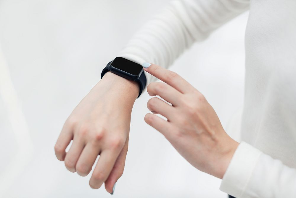 Asian girl wearing smart watch futuristic technology