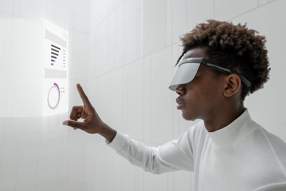 Man wearing smart glasses mockup touching a virtual screen psd