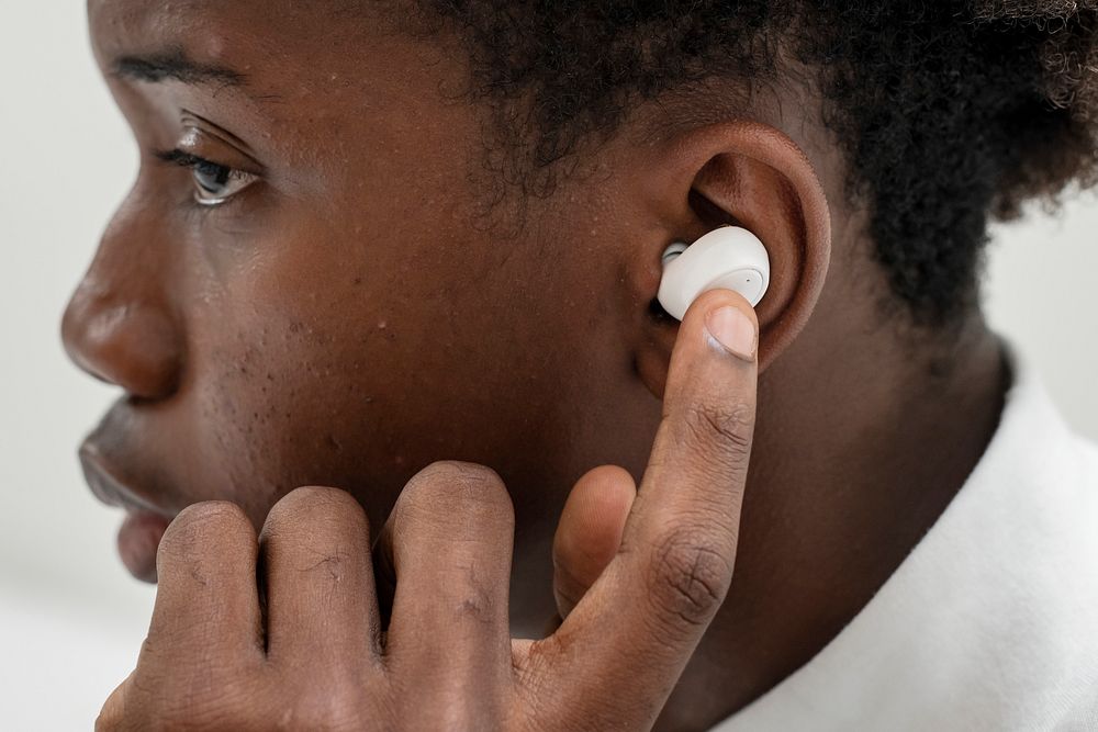 On the phone with wireless earbuds