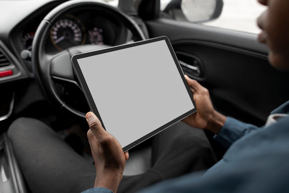 Blank digital tablet screen in a self driving car