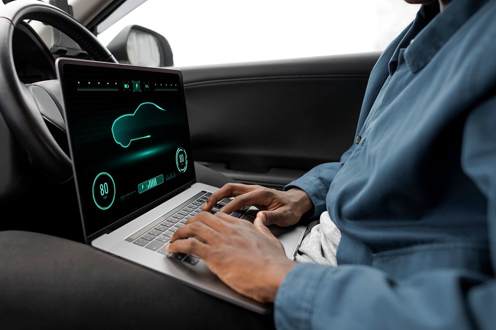 Laptop screen mockup with speedometer in a new self driving car psd