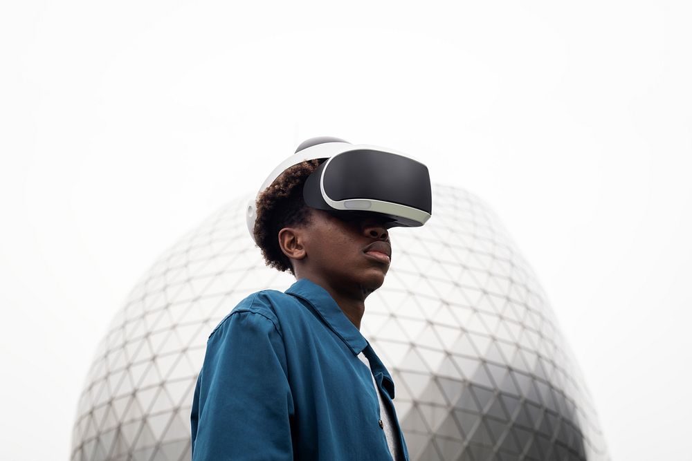 Man wearing VR headset outdoor futuristic technology