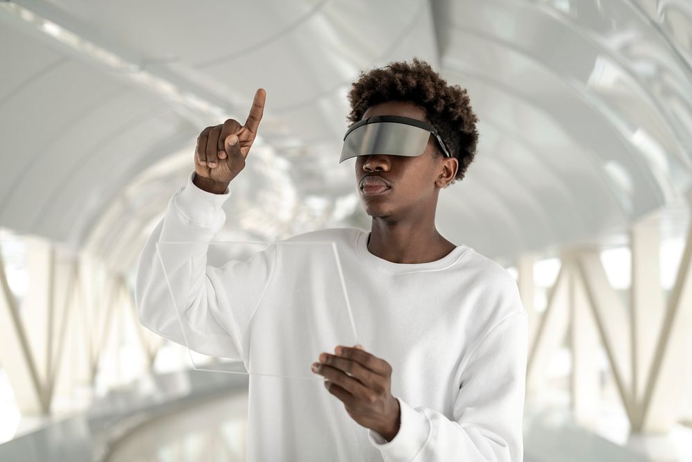 Man wearing smart glasses touching a virtual screen  futuristic technology