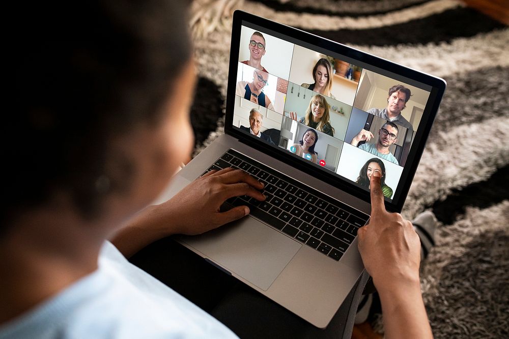 Woman making a video call on a laptop mockup