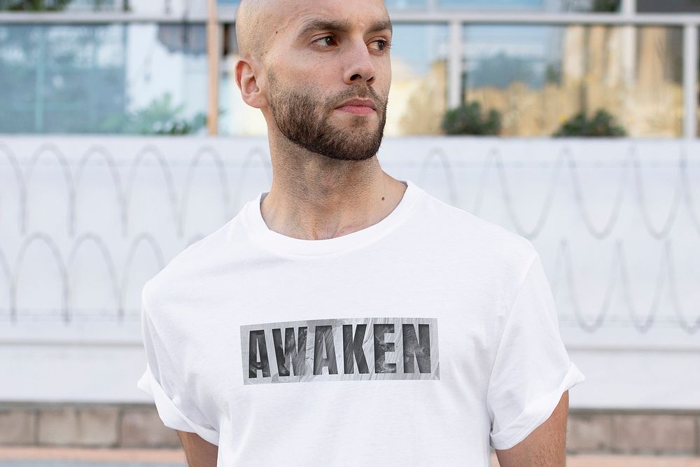 Awaken white t-shirt mockup psd men&rsquo;s simple streetwear outdoor shoot