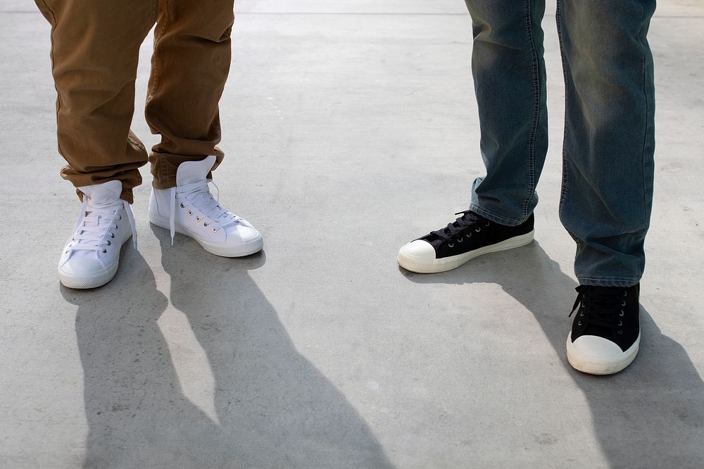 Men&rsquo;s ankle sneakers mockup psd white and black street style apparel shoot