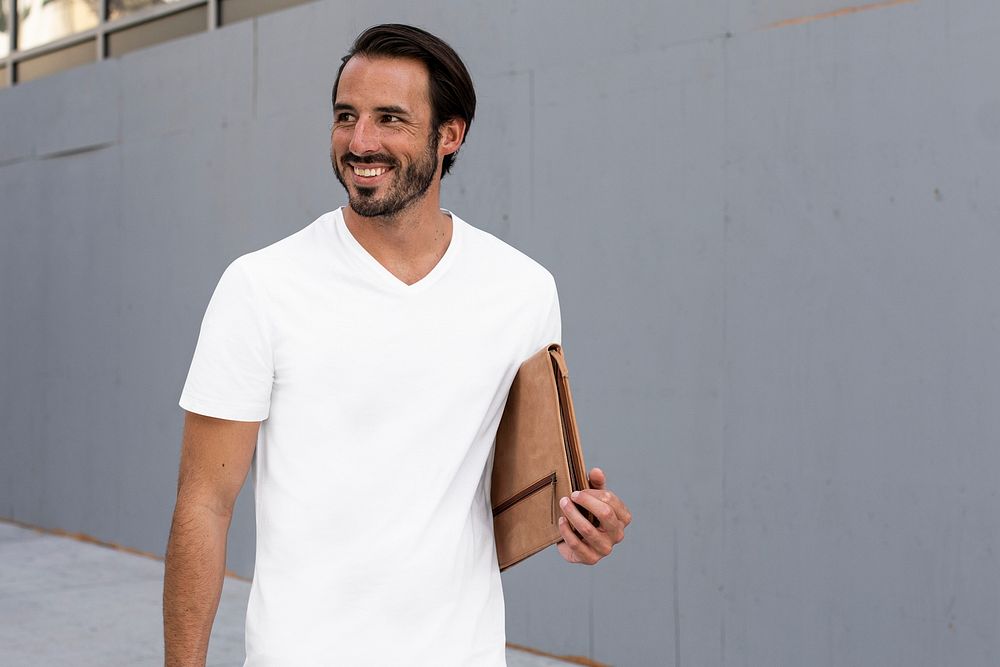 Casual white t-shirt mockup psd man in the city apparel shoot