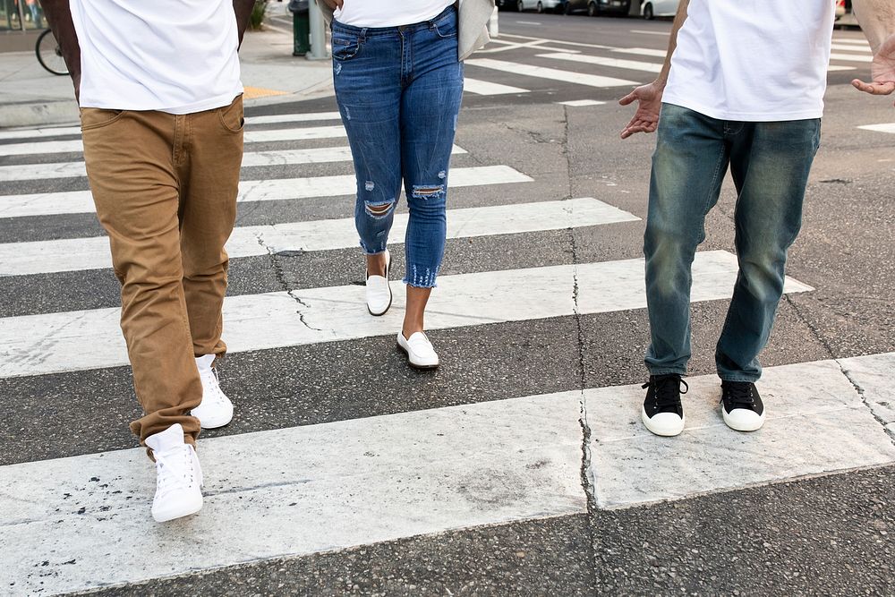 Streetwear apparel jeans mockup psd men and women crossing road in city
