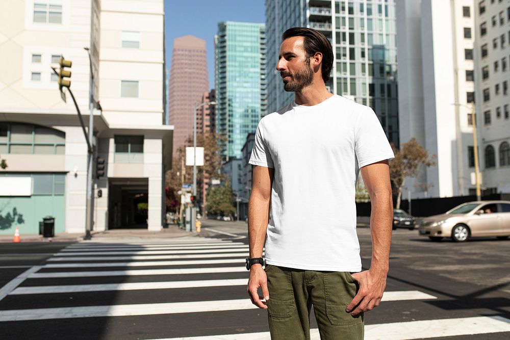 Casual dressed man crossing the road outdoor photoshoot