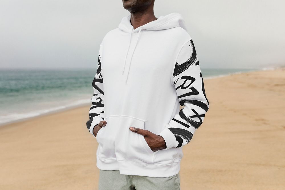 African American man in hoodie posing outdoor photoshoot