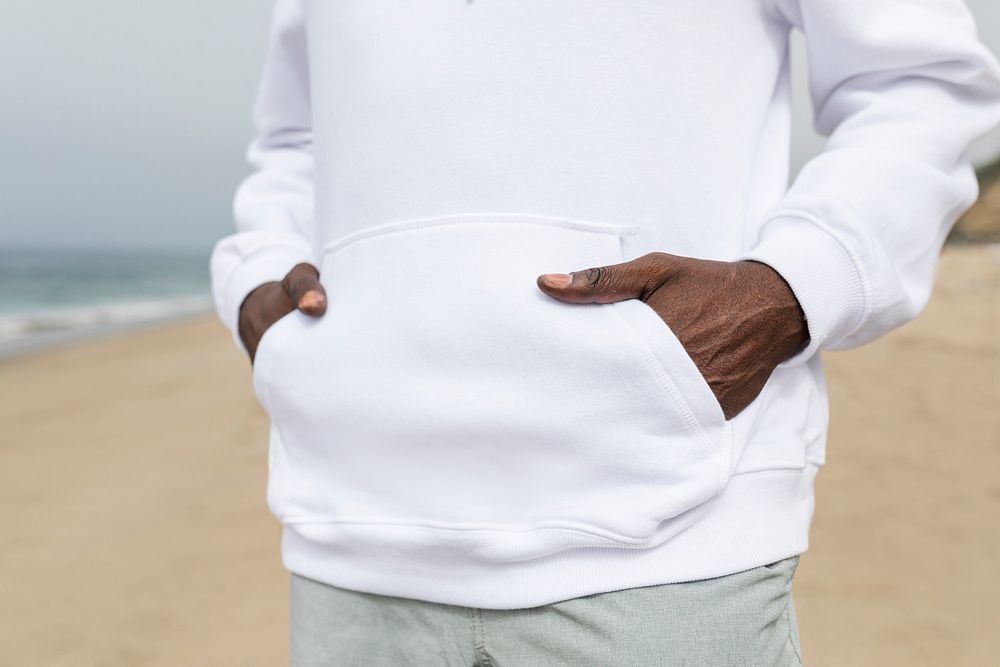White hoodie pocket close up simple apparel shoot